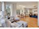 Open concept kitchen and dining area with hardwood floors at 551 Lees Mill Rd, Fayetteville, GA 30214