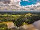 Aerial view showcasing the property's serene lakefront setting at 183 Madden Rd, Bowdon, GA 30108