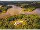 Aerial view of lakefront home and expansive lot at 183 Madden Rd, Bowdon, GA 30108