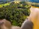 Aerial view showcasing the property's waterfront location at 183 Madden Rd, Bowdon, GA 30108