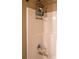 Clean bathroom with shower/tub combo and storage at 183 Madden Rd, Bowdon, GA 30108
