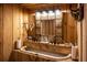 Charming bathroom with a unique vessel sink and wood accents at 183 Madden Rd, Bowdon, GA 30108