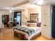 Spacious primary bedroom with a king-size bed and built-in wardrobes at 183 Madden Rd, Bowdon, GA 30108