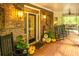 Inviting front porch with rocking chairs and pumpkins at 183 Madden Rd, Bowdon, GA 30108