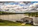 Serene lakefront view with a covered boat dock at 183 Madden Rd, Bowdon, GA 30108