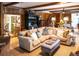 Large living room with sectional sofa and hardwood floors at 183 Madden Rd, Bowdon, GA 30108