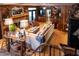 Open living room with sectional sofa and fireplace at 183 Madden Rd, Bowdon, GA 30108