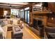 Spacious living room featuring a cozy fireplace and comfortable seating at 183 Madden Rd, Bowdon, GA 30108