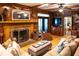 Spacious living room with sectional sofa and fireplace at 183 Madden Rd, Bowdon, GA 30108