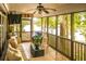 Spacious screened porch overlooking a tranquil lake view at 183 Madden Rd, Bowdon, GA 30108