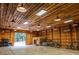 Spacious workshop with high ceilings, concrete floor, and ample storage at 183 Madden Rd, Bowdon, GA 30108