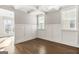 Formal dining room with hardwood floors and wainscoting at 613 Cork St, Woodstock, GA 30188