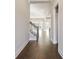 Hardwood floors and staircase leading to upper level at 613 Cork St, Woodstock, GA 30188