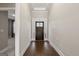 View of front door from interior hallway at 613 Cork St, Woodstock, GA 30188