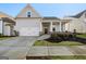 Craftsman style home with front porch and two-car garage at 613 Cork St, Woodstock, GA 30188