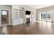 Living area features fireplace and built-in shelving at 613 Cork St, Woodstock, GA 30188
