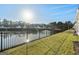 Waterfront property with pond and community view at 613 Cork St, Woodstock, GA 30188