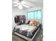 Bedroom with a full-size bed and plenty of closet space at 261 Coral Cir, Mcdonough, GA 30253