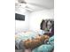 Bedroom with full-size bed and a large TV at 261 Coral Cir, Mcdonough, GA 30253