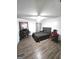 Spacious bedroom with wood-look floors and ceiling fan at 261 Coral Cir, Mcdonough, GA 30253