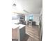 Kitchen with gray cabinets and stainless steel appliances at 261 Coral Cir, Mcdonough, GA 30253