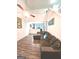 Open living room with L-shaped sectional sofa and high ceilings at 261 Coral Cir, Mcdonough, GA 30253