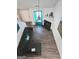 Spacious living room with fireplace and wood-look floors at 261 Coral Cir, Mcdonough, GA 30253