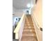 Indoor staircase leading to the upper level at 261 Coral Cir, Mcdonough, GA 30253