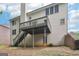 House exterior showcasing a deck and stairs leading to the backyard at 4543 Red Tail Dr, Lithonia, GA 30038