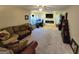 Living Room with sectional sofa and fireplace at 110 Kari Glen Way, Fayetteville, GA 30215