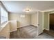 Spacious finished basement bedroom with carpet flooring and window at 4436 Malibu Dr, Decatur, GA 30035