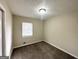Bright bedroom with neutral walls and brown carpet at 4436 Malibu Dr, Decatur, GA 30035