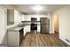 Modern kitchen with stainless steel appliances and granite countertops at 4436 Malibu Dr, Decatur, GA 30035
