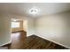 Open living area with hardwood floors and neutral-toned walls at 4436 Malibu Dr, Decatur, GA 30035
