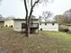 Home features a deck and a spacious backyard at 10178 Allen Sw Dr, Covington, GA 30014