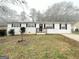 Newly painted Ranch home with a welcoming front porch and landscaping at 10178 Allen Sw Dr, Covington, GA 30014