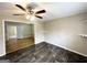 Bright living room with hardwood floors and a view into an adjacent room at 10178 Allen Sw Dr, Covington, GA 30014