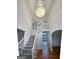 Grand two-story entryway with hardwood floors and a crystal chandelier at 3714 Thunder Ne Way, Marietta, GA 30066