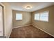 Bright bedroom with neutral walls, plush carpeting, and ample natural light at 3975 Phylis Pl, Decatur, GA 30035