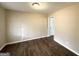 Bright living room with hardwood floors and access to other rooms at 3975 Phylis Pl, Decatur, GA 30035