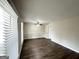 Bright living room with hardwood floors and neutral walls at 1914 Janet Ln, Decatur, GA 30035
