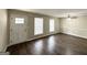 Spacious living area featuring hardwood floors and large windows at 1914 Janet Ln, Decatur, GA 30035