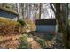 Backyard with shed and stone pathway at 4618 Shallowford Rd, Roswell, GA 30075