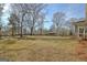 Large backyard with a grassy area at 33 Ball St, Moreland, GA 30259