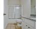 Clean bathroom with granite countertop and tiled floor at 33 Ball St, Moreland, GA 30259