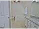 Bathroom includes garden tub, double vanity, and toilet at 33 Ball St, Moreland, GA 30259