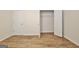 Bedroom with a walk-in closet and wood floor at 33 Ball St, Moreland, GA 30259
