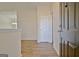 Bright entryway with hardwood floors and an interior door at 33 Ball St, Moreland, GA 30259