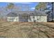 House exterior showcasing screened porch at 33 Ball St, Moreland, GA 30259