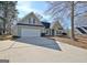 Two-story house with green siding and a spacious front yard at 33 Ball St, Moreland, GA 30259